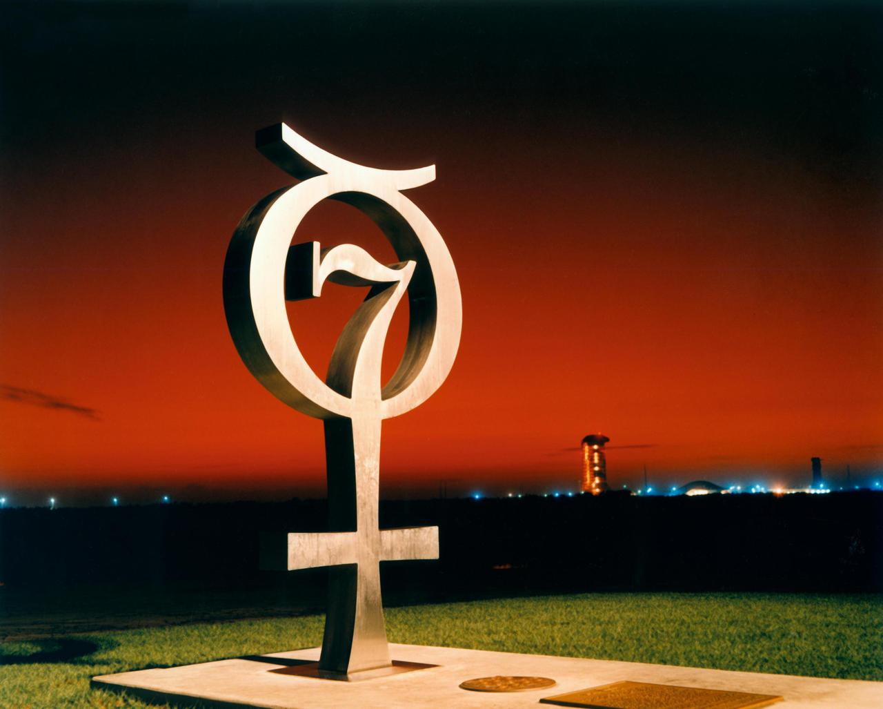 KENNEDY SPACE CENTER, FLA. --   The Mercury monument, honoring the original seven astronauts, is shown here at sunrise at Pad 14.