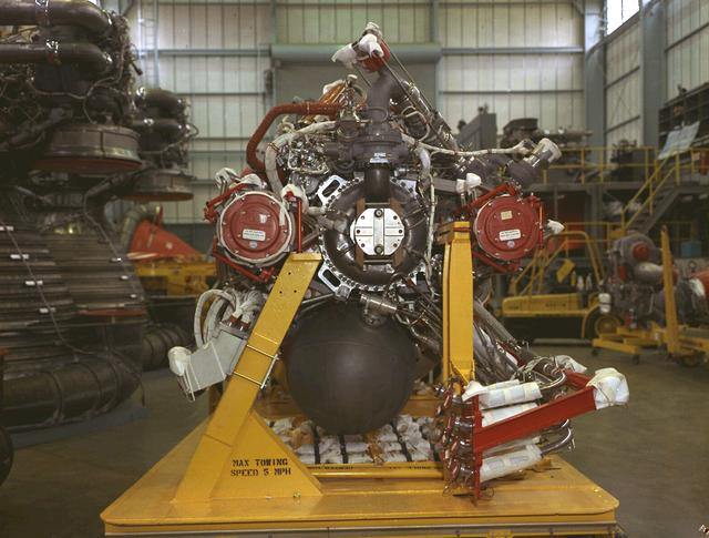 Pictured is a J-2 engine being processed at Marshall Space Flight Center (MSFC). A single J-2 engine was utilized on the S-IVB stage, the second stage of the Saturn IB and the third stage of the Saturn V vehicles, while a cluster of five J-2 engines powered the second (S-II) stage of the Saturn V launch vehicle. The Saturn V was designed, developed, and tested by engineers at MSFC.