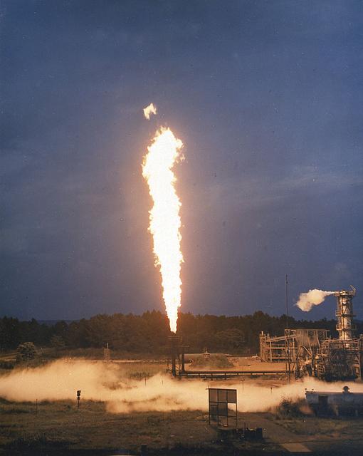 Marshall Space Flight Center's rocket development has always included component testing. Pictured here is a Cell 114-B burn stack. The C114-B is part of the gas generators used to test heat exchanges for the F-1 engine. On the initial firing of the C114-B the spark ignition would not light. The rocket propellant mixed with the liquid oxygen gelled creating a bomb. After several attempts at ignition, the spark ignited and blew up the stand. Subsequent testings were completed on newly constructed stands and no further mishaps were reported.