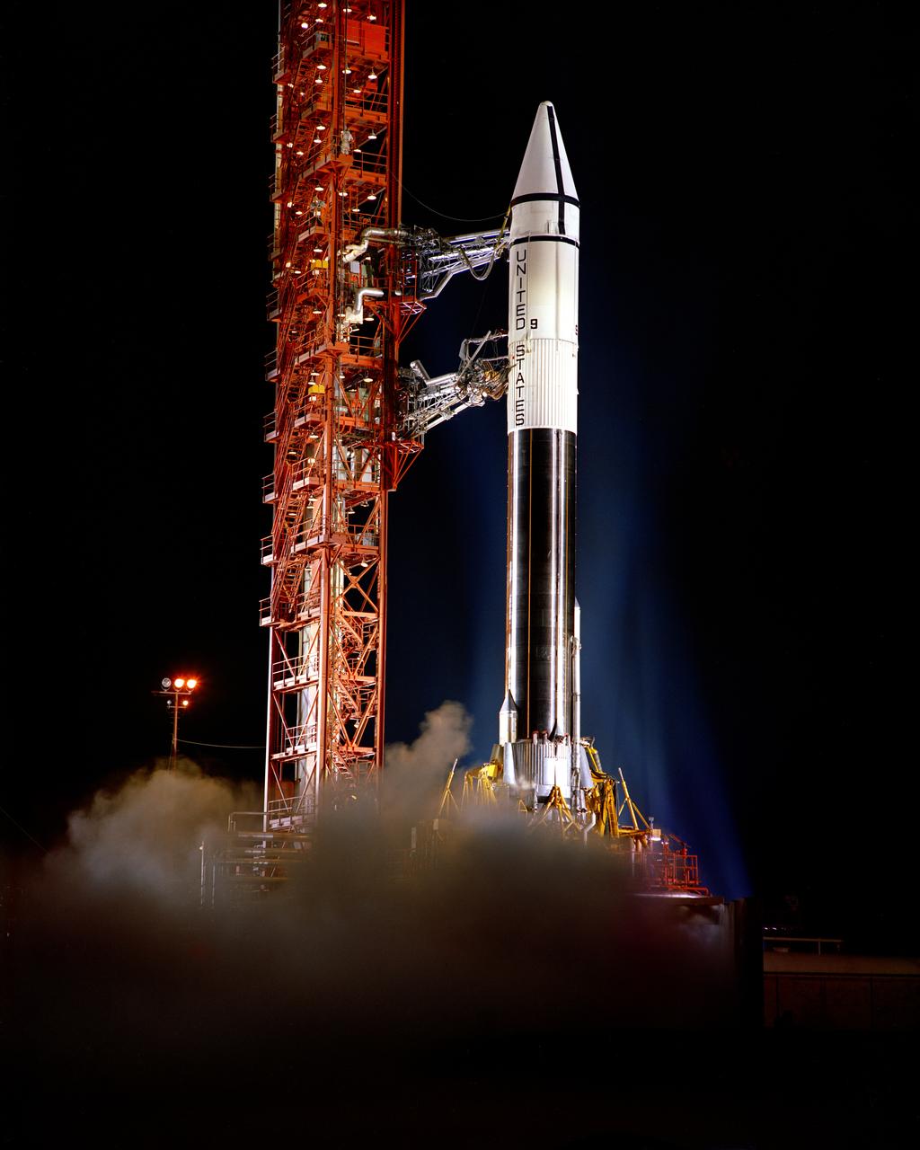 Pre-launch alert, Complex 36B.  Gantry pull back with LOX vapor around launcher, Centaur 9.  Surveyor Mass Model Spacecraft.