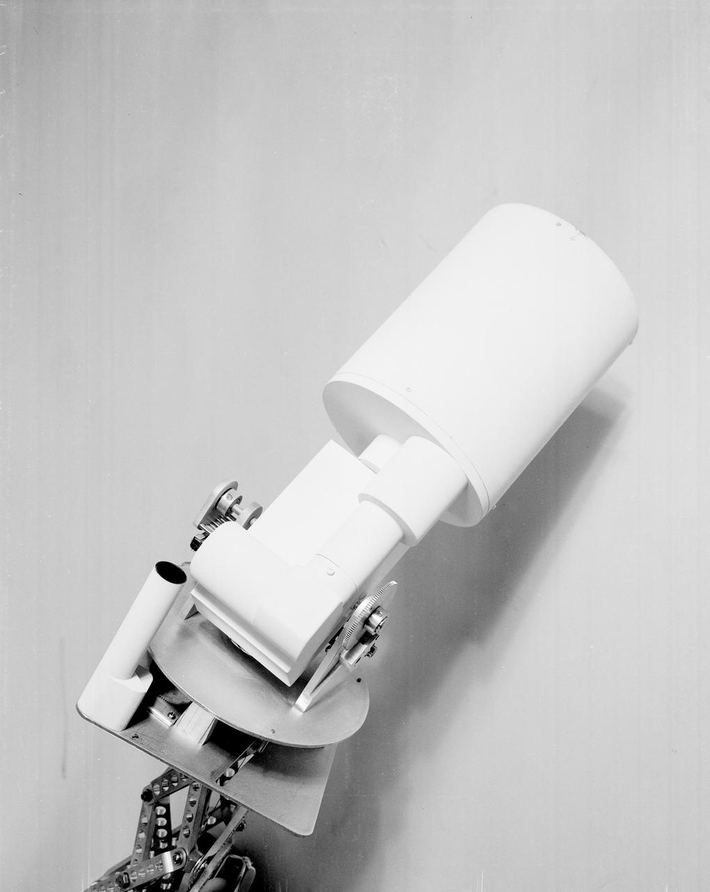 The Apollo Telescope Mount (ATM), designed and developed by the Marshall Space Flight Center, served as the primary scientific instrument unit aboard the Skylab. The ATM contained eight complex astronomical instruments designed to observe the Sun over a wide spectrum from visible light to x-rays. This photo depicts a mockup of the ATM contamination monitor camera and photometer.