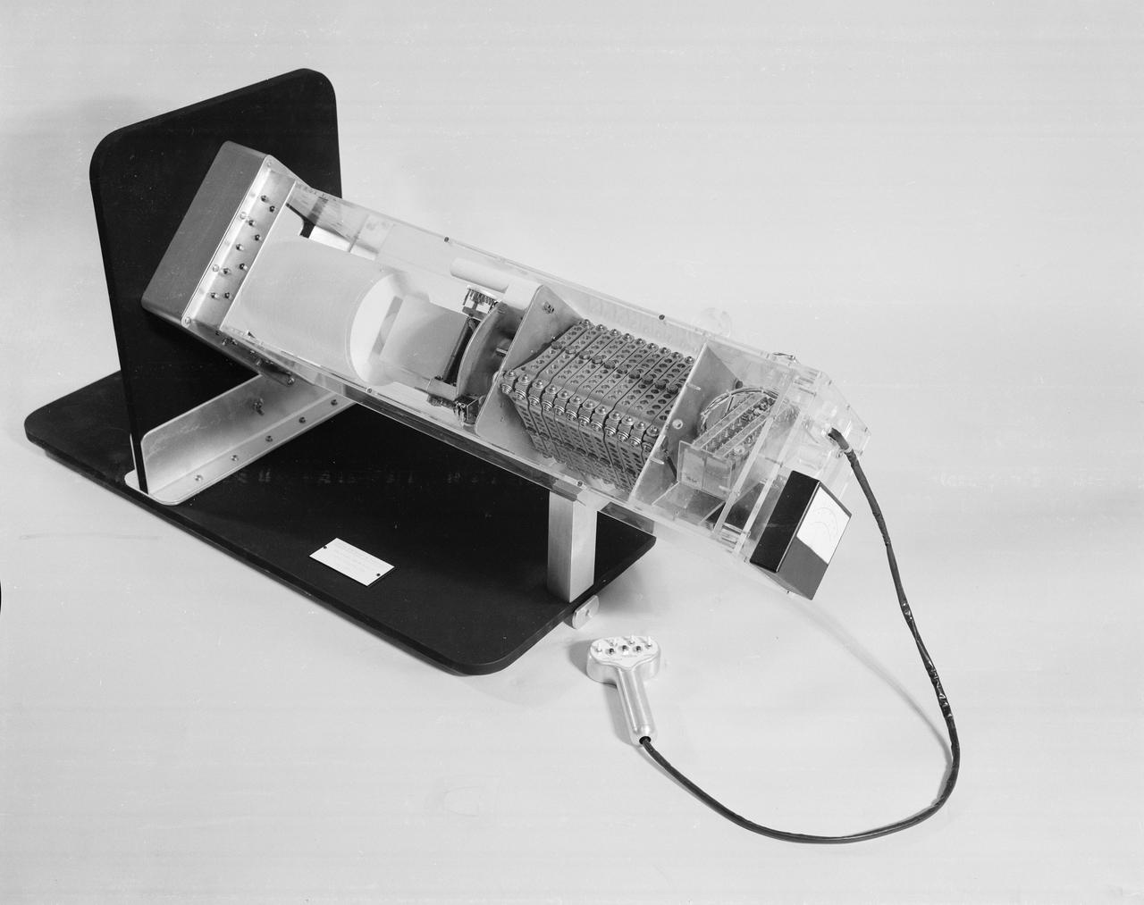 The Apollo Telescope Mount (ATM), designed and developed by the Marshall Space Flight Center, served as the primary scientific instrument unit aboard the Skylab. The ATM contained eight complex astronomical instruments designed to observe the Sun over a wide spectrum from visible light to x-rays. This angle view is of an ATM contamination monitor meter mockup.