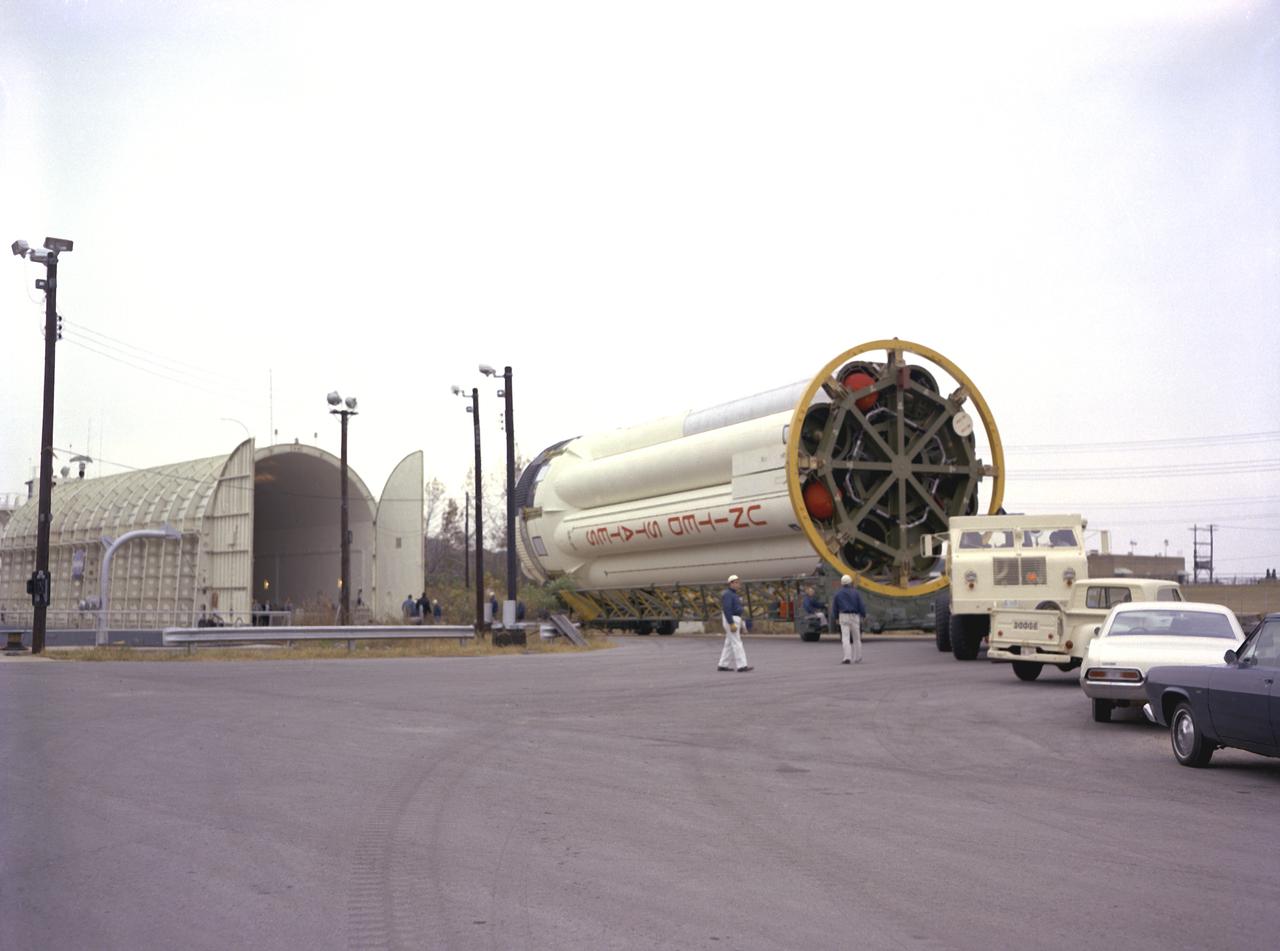 Workmen at the Marshall Space Flight Center's (MSFC's) dock on the Ternessee River unload S-IB-211, the flight version of the Saturn IB launch vehicle's first stage, from the NASA barge Palaemon. Between December 1967 and April 1968, the stage would undergo seven static test firings in Marshall's S-IB static test stand.