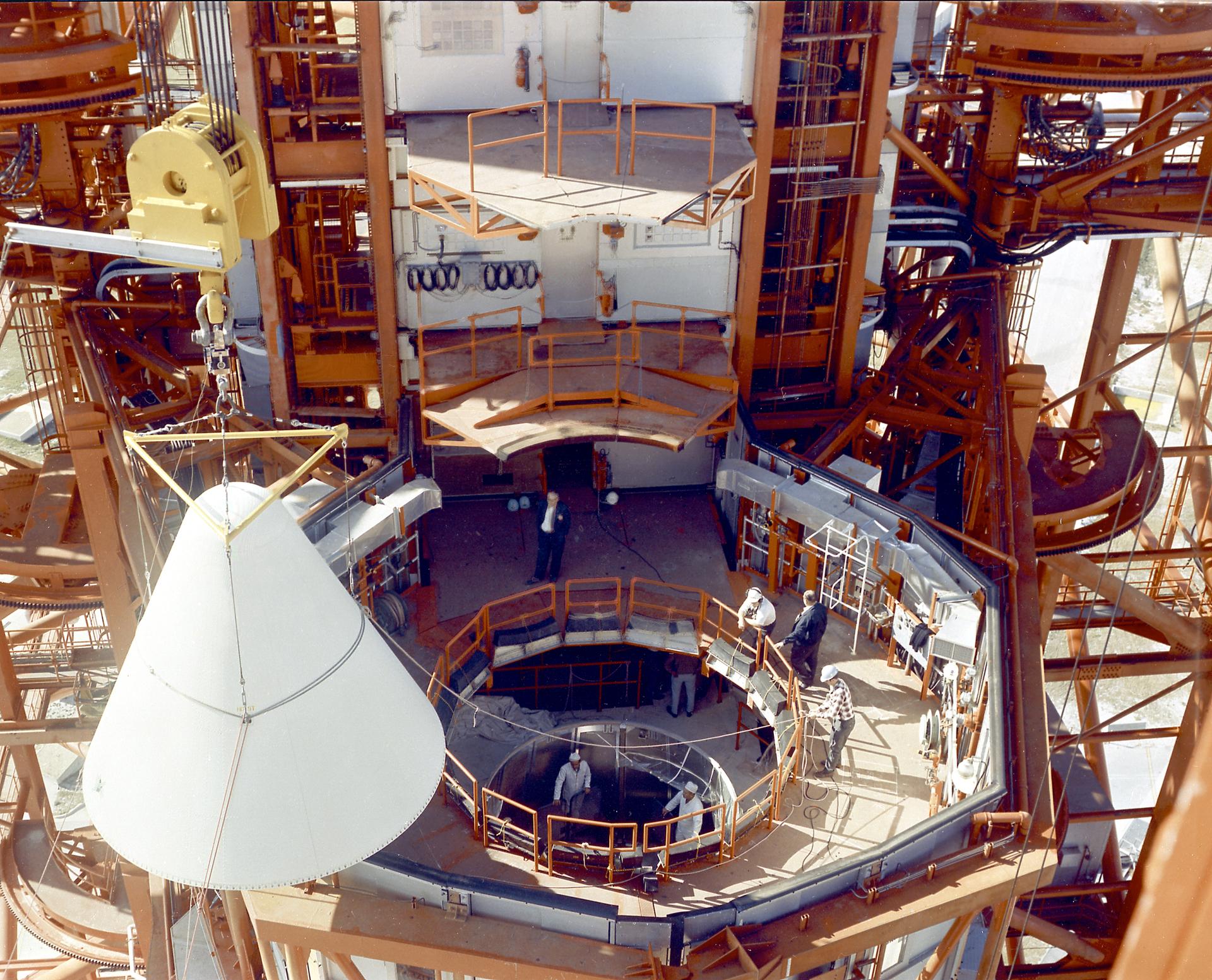 The Apollo 5 nose cone is placed