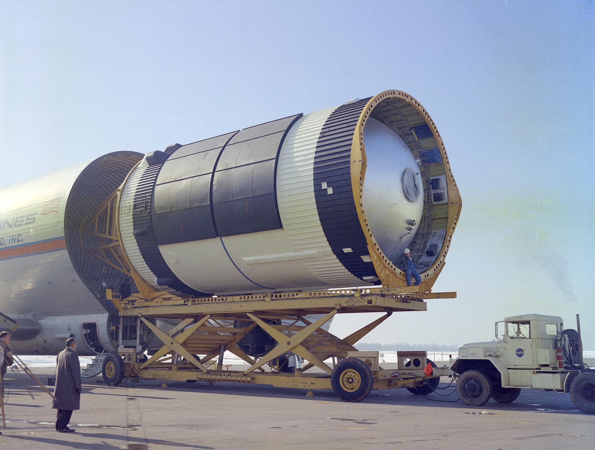 Skylab's Orbital Workshop, housed in a Saturn V upper stage, is unloaded from the Super Guppy in Huntsville Alabama.