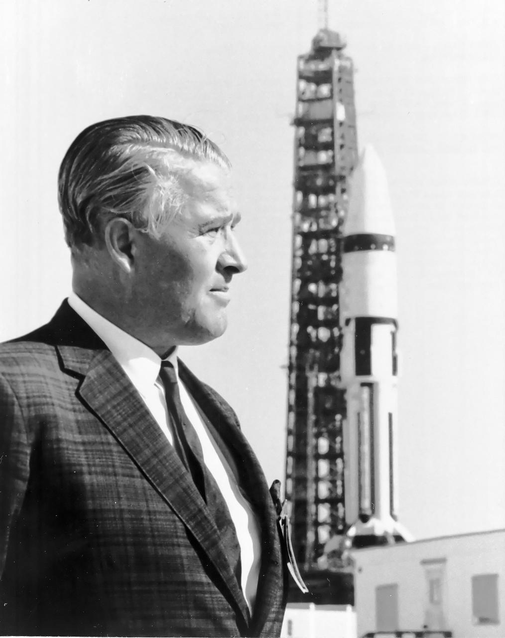 Dr. Wernher Von Braun, stands in front of a Saturn IB Launch Vehicle at Kennedy Space Center (KSC). Dr. Von Braun was Marshall's first Center Director (1960-1970). Under his leadership Marshall was responsible for the development of the Saturn rockets, the Skylab project and getting the United States into Space and landing on the moon with the Apollo missions. 