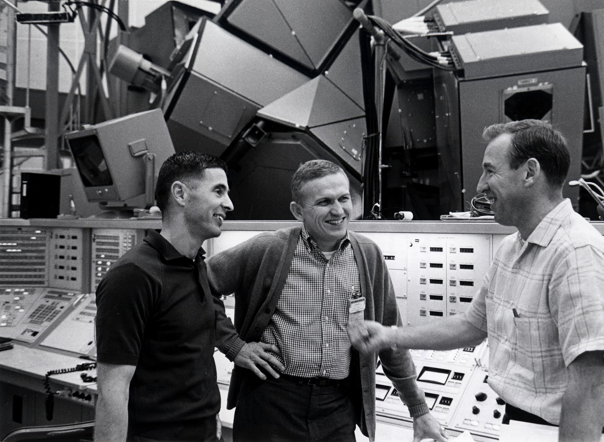 The Apollo 8 prime crew talks with one another during training