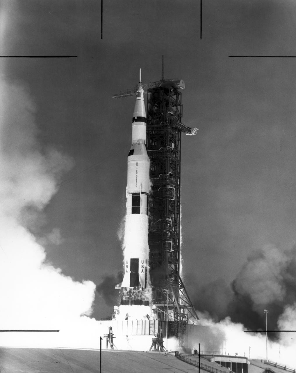 The Saturn V launch vehicle, developed by the Marshall Space Flight Center (MSFC) under the direction of Dr. Wernher von Braun, lifts off from the Kennedy Space Center (KSC), Florida carrying the Apollo 11 spacecraft and crew. The massive rocket hurled the spacecraft into Earth orbit and then onto the trajectory to the Moon. Apollo 11, the first manned lunar mission, launched from KSC on July 16, 1969 and safely returned to Earth on July 24, 1969. Aboard were astronauts Neil A. Armstrong, commander; Michael Collins, Command Module (CM) pilot; and Edwin E. Aldrin Jr., Lunar Module (LM) pilot. The CM, piloted by Michael Collins remained in a parking orbit around the Moon while the LM, named “Eagle’’, carrying astronauts Neil Armstrong and Edwin Aldrin, landed on the Moon. Armstrong was the first human to ever stand on the lunar surface, followed by Edwin (Buzz) Aldrin.  During 2½ hours of surface exploration, the crew collected 47 pounds of lunar surface material for analysis back on Earth. With the success of Apollo 11, the national objective to land men on the Moon and return them safely to Earth had been accomplished. 