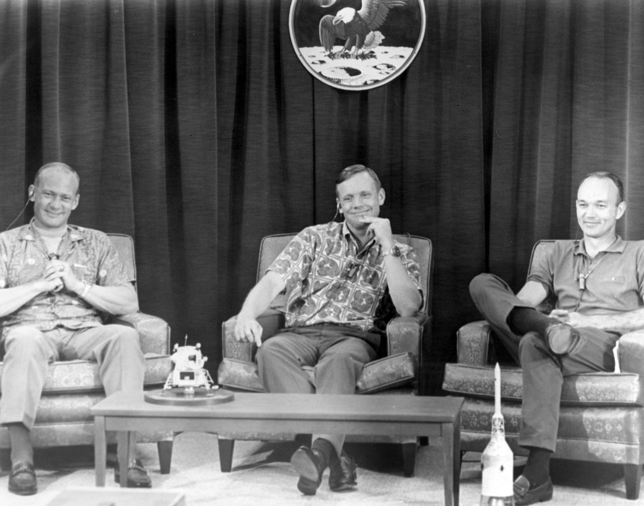 Apollo 11 crew members (L-R) Edwin Aldrin, Neil Armstrong, and Michael Collins were amused by a question posed during a closed circuit press conference the night before they began their historic first lunar landing mission. The press conference with questions via intercom, was held under semi-isolation conditions to avoid exposing the astronauts to possible illness at the last minute. The Apollo 11 mission launched from the Kennedy Space Center (KSC) in Florida via the Marshall Space Flight Center (MSFC) developed Saturn V launch vehicle on July 16, 1969 and safely returned to Earth on July 24, 1969. Aboard the space craft were astronauts Neil A. Armstrong, commander; Michael Collins, Command Module (CM) pilot; and Edwin E. (Buzz) Aldrin Jr., Lunar Module (LM) pilot. The CM, “Columbia”, piloted by Collins, remained in a parking orbit around the Moon while the LM, “Eagle’’, carrying astronauts Armstrong and Aldrin, landed on the Moon. On July 20, 1969, Armstrong was the first human to ever stand on the lunar surface, followed by Aldrin. During 2½ hours of surface exploration, the crew collected 47 pounds of lunar surface material for analysis back on Earth. With the success of Apollo 11, the national objective to land men on the Moon and return them safely to Earth had been accomplished.  