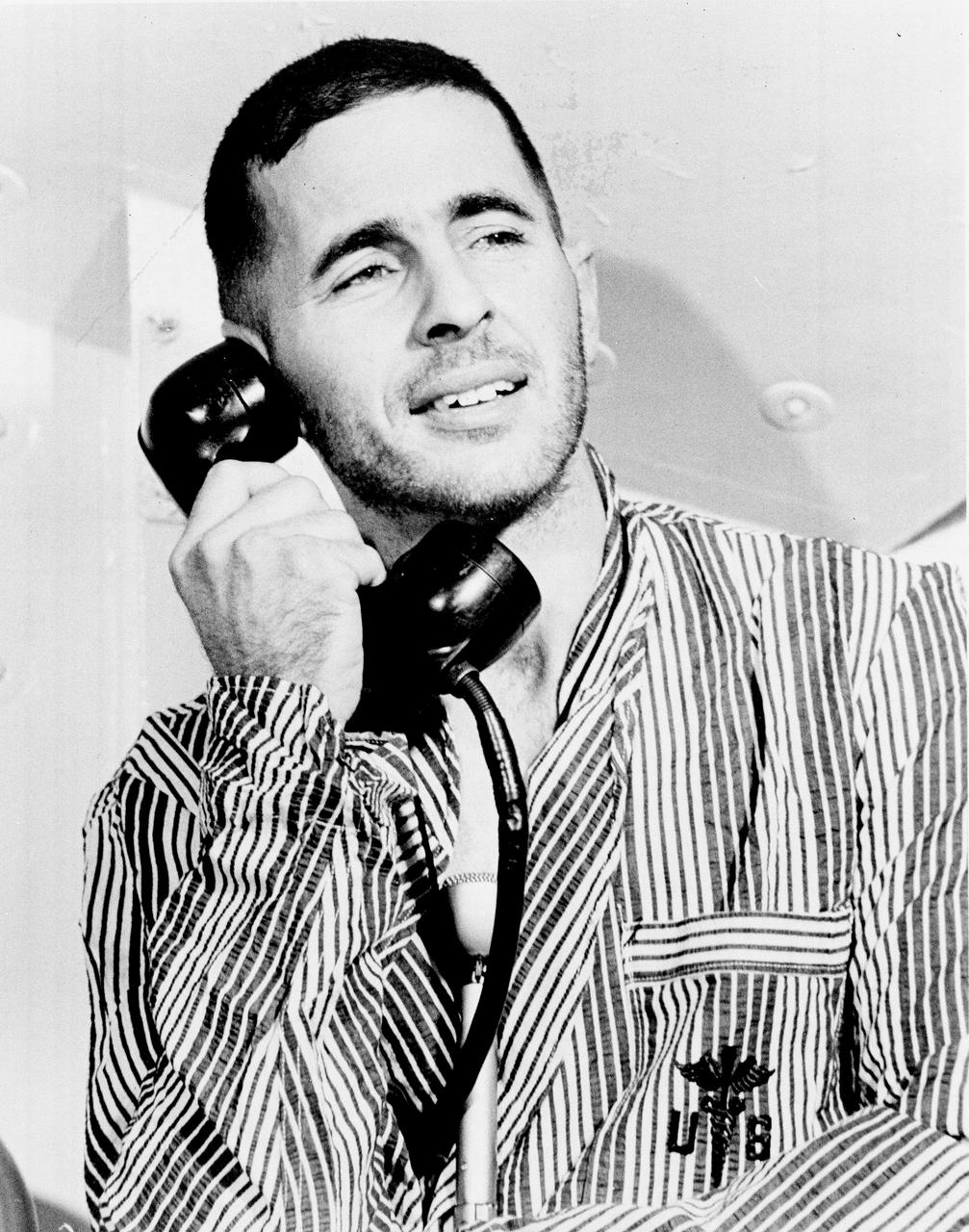 Apollo 8 Astronaut William Anders, Lunar Module (LM) pilot of the first manned Saturn V space flight into Lunar orbit, accepted a phone call from the U.S. President Lyndon B. Johnson prior to launch. Anders, along with astronauts James Lovell, Command Module (CM) pilot, and Frank Borman, commander, launched aboard the Apollo 8 mission on December 21, 1968 and returned safely to Earth on December 27, 1968. The mission achieved operational experience and tested the Apollo command module systems, including communications, tracking, and life-support, in cis-lunar space and lunar orbit, and allowed evaluation of crew performance on a lunar orbiting mission. The crew photographed the lunar surface, both far side and near side, obtaining information on topography and landmarks as well as other scientific information necessary for future Apollo landings. All systems operated within allowable parameters and all objectives of the mission were achieved. 