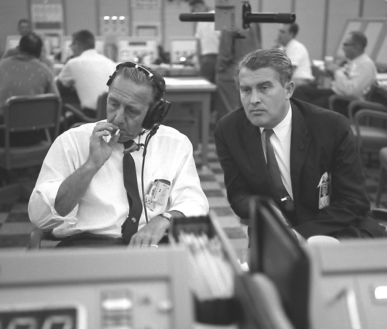Dr. von Braun, Director of the Marshall Space Flight Center (MSFC), and Dr. Debus, Director of Launch Operations Directorate, photographed in the blockhouse during the Apollo launch simulation.