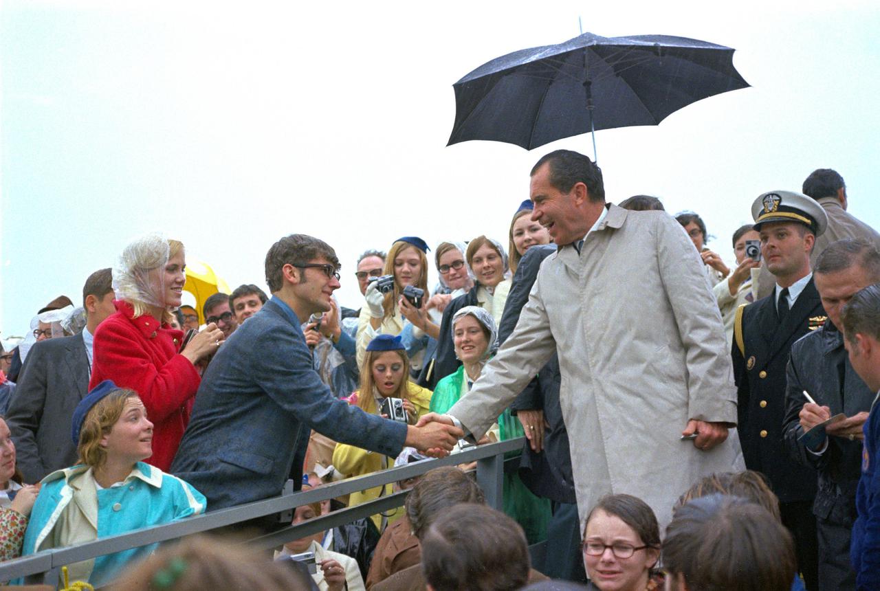 KENNEDY SPACE CENTER, FLA. - President Richard M. Nixon greets crowd gathered to watch the Apollo 12 launch at Kennedy Space Center.