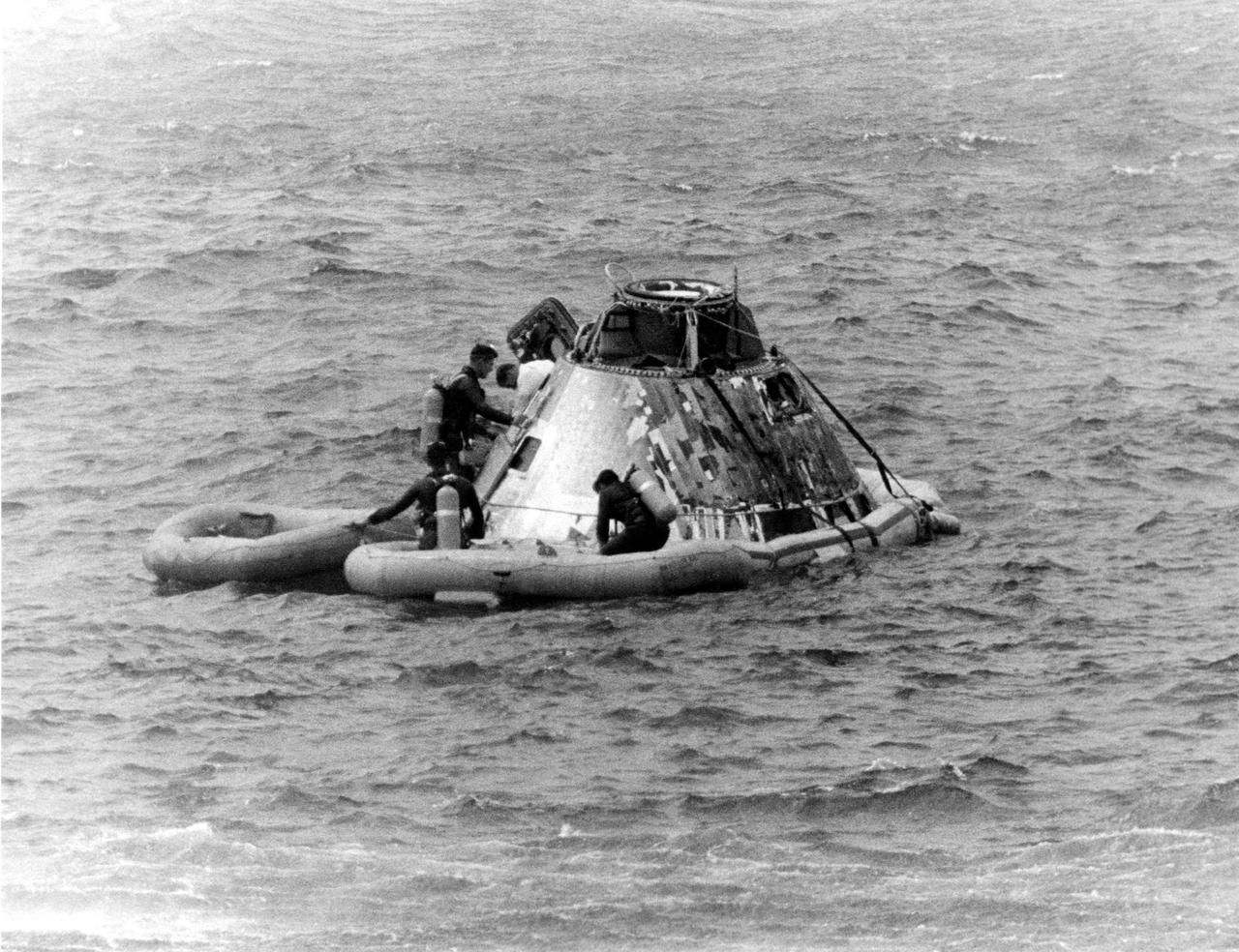 KENNEDY SPACE CENTER, FLA. -- Pararescueman helps Apollo 9 Command Module Pilot David R. Scott from the spacecraft today during recovery at completion of the 10-day Earth orbital flight with James A. McDivitt and Russell L. Schweickart, still in the spacecraft. The astronauts splashed down less than five miles from the USS Guadalcanal, prime recovery ship, at the beginning of their 152nd revolution. During the highly successful flight, they extensively tested the lunar module spacecraft, paving the way for a similar one to carry Americans to the Moon later this year. They were lalunched March 3 by an Apollo_Saturn V space vehicle from the Kennedy Space Center at the start of NASA's third manned mission using an Apollo spacecraft.