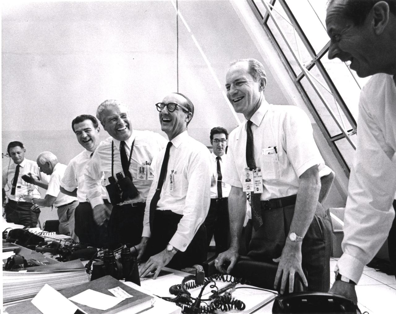 KENNEDY SPACE CENTER, FLA. -  Apollo 11 mission officials relax in the Launch Control Center following the successful Apollo liftoff today.  From left to right are Charles W. Mathews, deputy associate administrator for Manned Space Flight; Dr. Wernher von Braun, director of the Marshall Space Flight Center; Dr. George E. Mueller, associate administrator for Manned Space Flight; and Lt. Gen. Samuel C. Phillips, director of the Apollo Program.