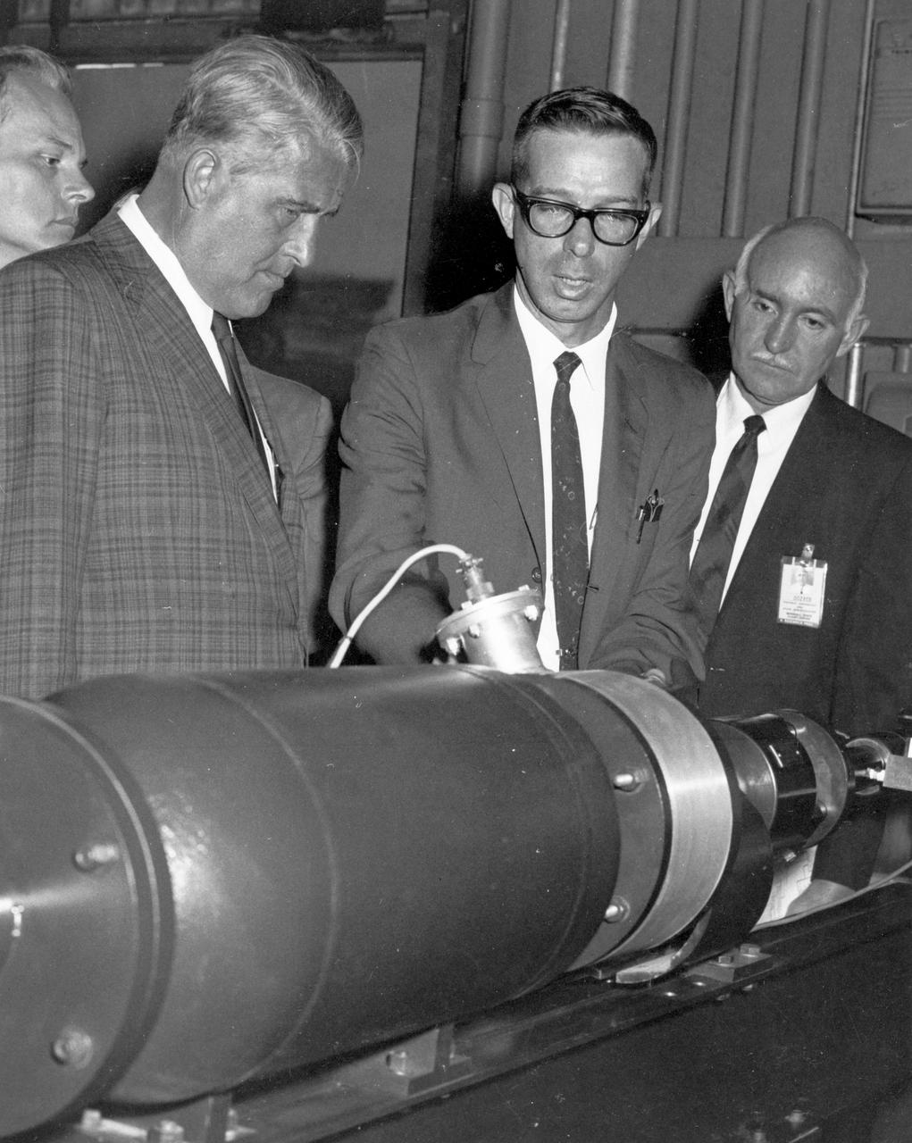 Marshall Space Flight Center’s (MSFC) director, Dr. Wernher von Braun (far left), gets a briefing on an experiment being conducted in MSFC’s Space Sciences Laboratory during a tour on August 28, 1967.