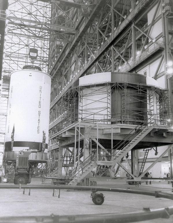 This Saturn V S-II (second) stage is being lifted into position for a test at the Vehicle Assembly Building at the Kennedy Space Center. When the Saturn V booster stage (S-IC) burned out and dropped away, power for the Saturn was provided by the 82-foot-long and 33-foot-diameter S-II stage. Developed by the Space Division of North American Aviation under the direction of the Marshall Space Flight Center, the stage utilized five J-2 engines, each producing 200,000 pounds of thrust. The engines used liquid oxygen and liquid hydrogen as propellants. The towering 363-foot Saturn V was a multi-stage, multi-engine launch vehicle standing taller than the Statue of Liberty. Altogether, the Saturn V engines produced as much power as 85 Hoover Dams.  