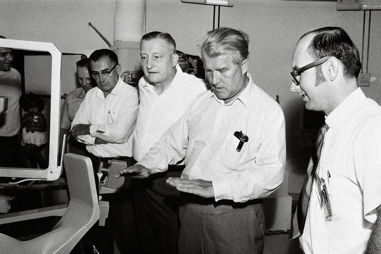 This photograph was taken after Dr. von Braun moved from his post as Director of the Marshall Space Flight Center (MSFC) to Deputy Associate Administrator for Plarning at NASA Headquarters. On June 27, 1970, he visited the MSFC again to look at a mockup of the spacecraft that would later be known as Skylab. Others in the photograph are, from left to right, James R. Thompson, David Newby, Karl Heimburg, Hermann Weidner, and Jack Stockes. Years later, Thompson would serve as Director of the MSFC.
