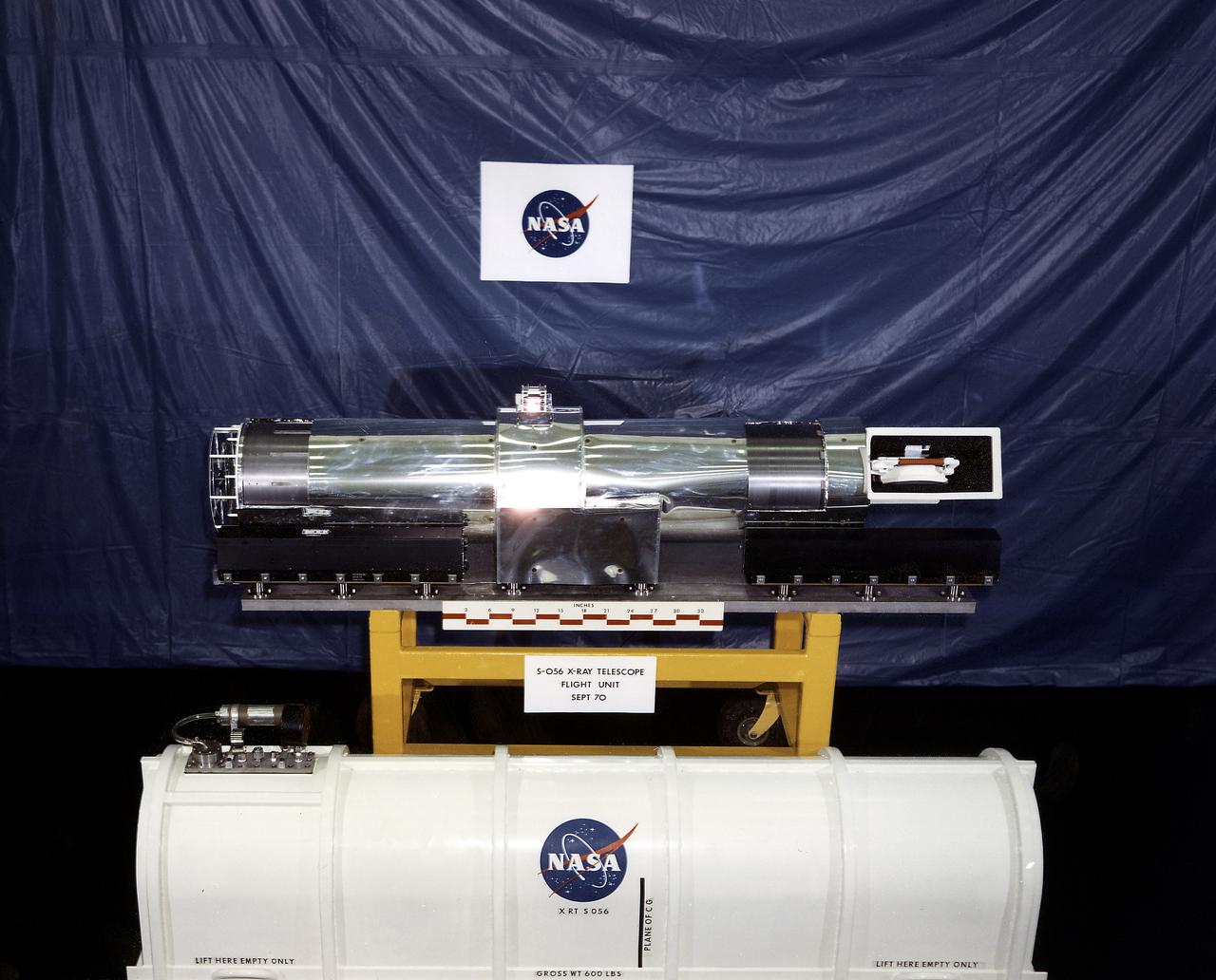 This 1970 photograph shows Skylab's Dual X-Ray Telescopes, an Apollo Telescope Mount facility. It was designed to gather solar radiation data in the x-ray region of the solar spectrum and provide information on physical processes within the solar atmosphere. In support of the two primary telescopes, auxiliary instruments provided a continuous record of the total x-ray flux in two bands. A flare detector was also provided at the control console as an aid to astronauts for monitoring solar activity. The Marshall Space Flight Center had program management responsibility for the development of Skylab hardware and experiments. 