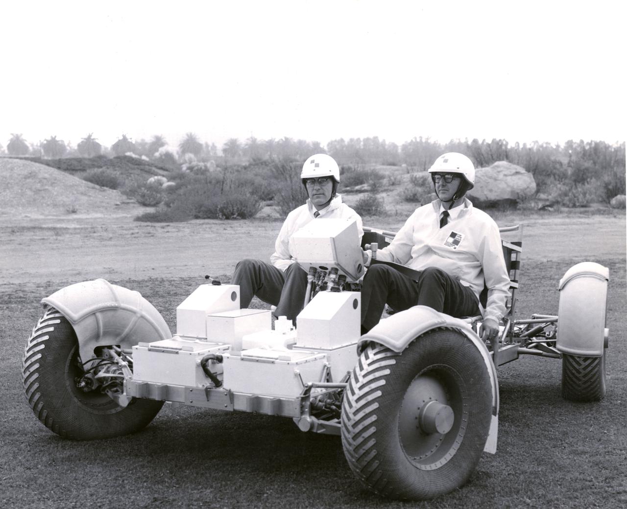 Delco engineers are operating this Lunar Roving Vehicle (LRV) Trainer. Built by by Delco Electronics Division of the General Motors Corporation, the trainer was shipped to NASA’s Manned Spacecraft Center in Houston, Texas for an astronaut training program. Under the direction of Marshall Space Flight Center (MSFC), the LRV was designed to allow Apollo astronauts a greater range of mobility during lunar exploration missions. The LRVs were deployed during the last three Apollo missions; Apollo 15, Apollo 16, and Apollo 17. 