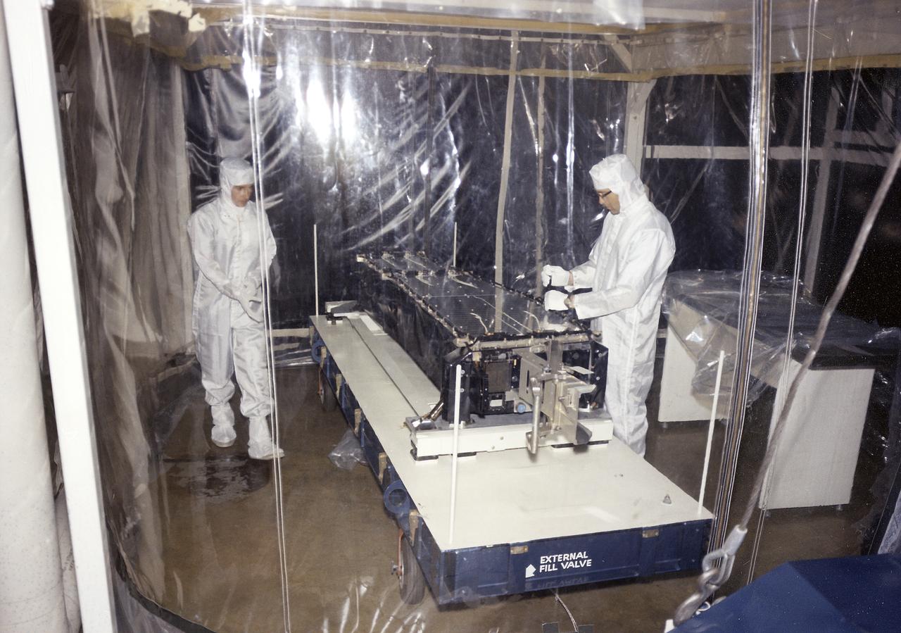 This photograph shows Skylab's Extreme Ultraviolet (XUV) Spectroheliograph during an acceptance test and checkout procedures in April 1971. The unit was an Apollo Telescope Mount (ATM) instrument designed to sequentially photograph the solar chromosphere and corona in selected ultraviolet wavelengths. The instrument also obtained information about composition, temperature, energy conversion and transfer, and plasma processes of the chromosphere and lower corona. The Marshall Space Flight Center had program management responsibility for the development of Skylab hardware and experiments.