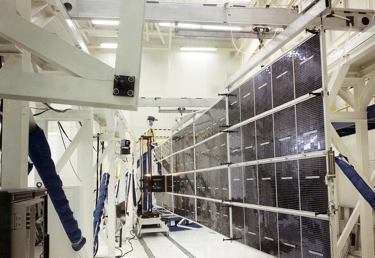 The Apollo Telescope Mount (ATM), one of four major components comprising Skylab, was designed and developed by the Marshall Space Flight Center. Power to operate the ATM's instruments and experiments was collected by four solar arrays, capable of producing up to 1.1 kilowatts of electricity. This is a photograph of the ATM Solar Array flight unit deployed for illumination testing. 