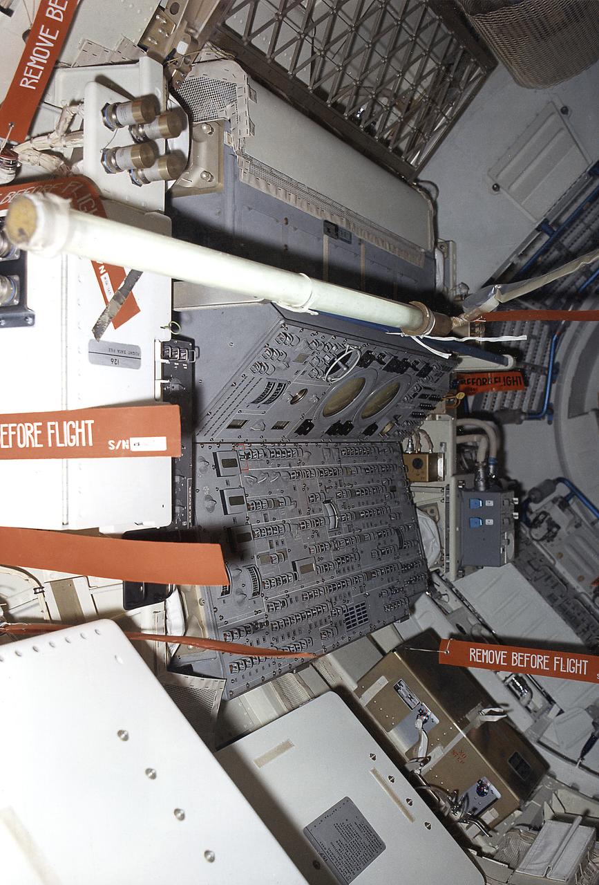 This September 1972 photograph shows the internal configuration of Skylab's Multiple Docking Adapter (MDA) flight article as it appeared during the Crew Compartment and Function Review at the Martin-Marietta Corporation's Space Center facility in Denver, Colorado. Designed and manufactured by the Marshall Space Flight Center, the MDA housed a number of experiment control and stowage units and provided a docking port for the Apollo Command Module.
