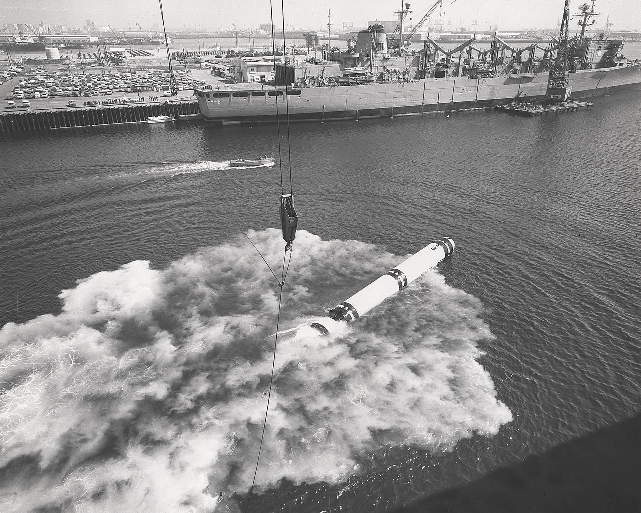 As early as September 1972, the Marshall Space Flight Center arnounced plans for a series of 20 water-entry simulation tests with a solid-fueled rocket casing assembly. The tests would provide valuable data for assessment of solid rocket booster parachute water recovery and aid in preliminary solid rocket motor design.