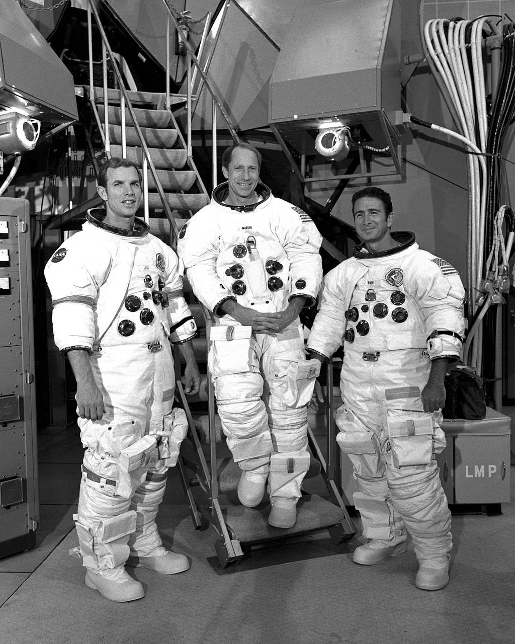 KENNEDY SPACE CENTER, FLA. - The Apollo 15 flight crew, Commander David R. Scott, Lunar Module Pilot James B. Irwin, and Command Module Pilot Alfred M. Worden, Jr., participate in a mission simulation in the Command Module and the Lunar Module.