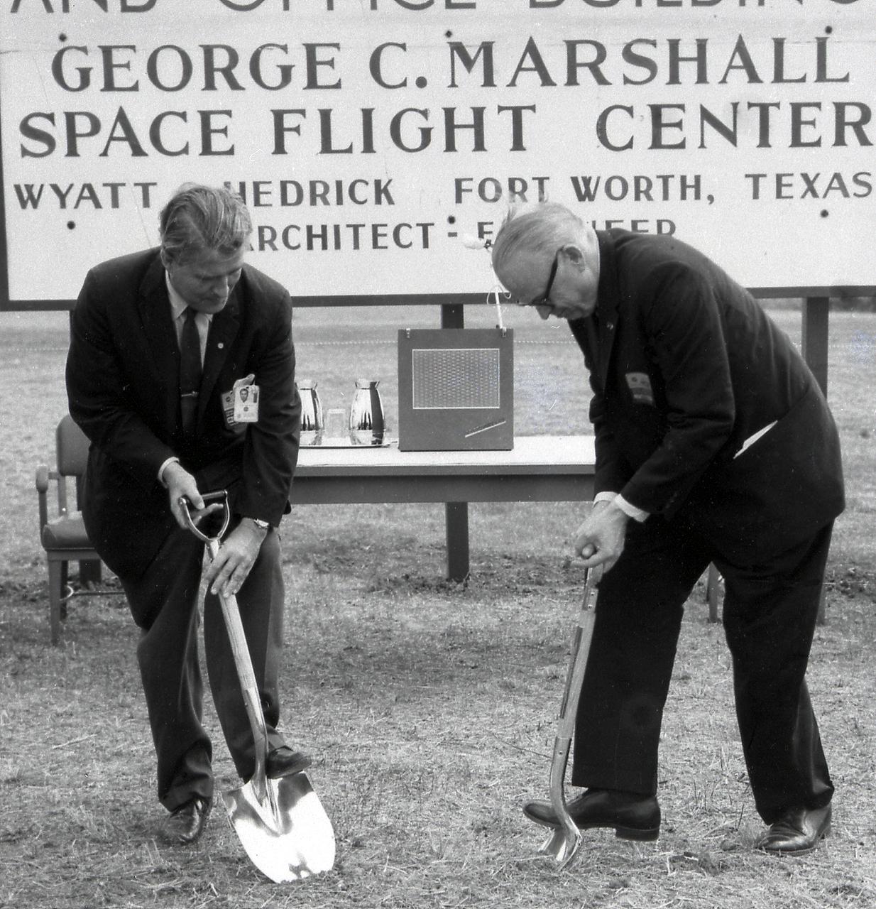 Dr. Wernher von Braun, Director of Marshall Space Flight Center (MSFC), teams up with Senator Robert S. Kerr, a chairman of the Senate Committee on Aeronautical and Space Sciences to break ground for MSFC's new Central Laboratory and Office Facility.
