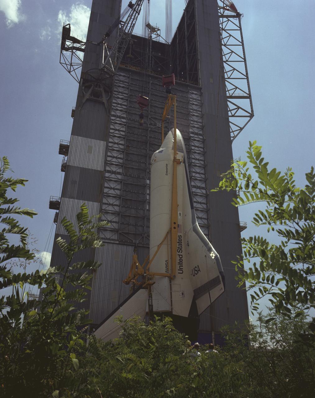 This photo depicts the removal of the Orbiter Enterprise from The Marshall Space Flight Center's Dynamic Test Stand after its first Mated Vertical Ground Vibration Test (MVGVT).
