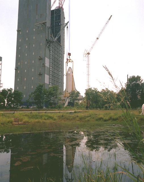 This photo is of the removal of the Orbiter Enterprise from the Marshall Space Flight Center's Dynamic Test Stand after its first Mated Vertical Ground Vibration Test (MVGVT).