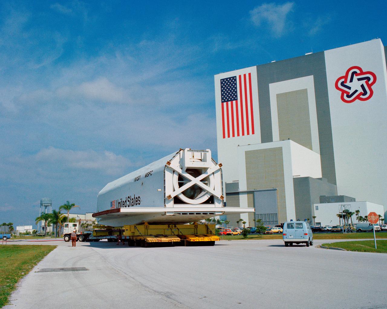 CAPE CANAVERAL, Fla. – At NASA's Kennedy Space Center in Florida, the space shuttle mock-up, dubbed Pathfinder, makes its trek from the turn basin to the Vehicle Assembly Building on April 5, 1978. The mock-up, constructed at NASA's Marshall Space Flight Center in Huntsville, Ala., possessed the general dimensions, weight and balance of a real space shuttle. It was shipped to Kennedy by barge and then used to fit-check the work platforms of the Mate-Demate Device, orbiter processing facilities and Vehicle Assembly Building, as well as support ground crew training. It also was used to rehearse post-landing procedures at Kennedy's Shuttle Landing Facility.  After being on display at the 'Great Space Shuttle Exposition' in Tokyo from June 1983 to August 1984, the mock-up returned to Marshall and now is on permanent display at the U.S. Space and Rocket Center near Huntsville. Photo credit: NASA