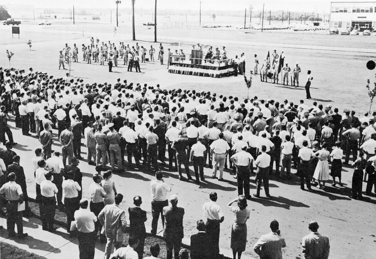 Dr. Wernher von Braun and Maj. Gen. August Schomburg officiate the official transfer of the Army Ballistic Missile Agency (ABMA) to the NASA George C. Marshall Space Flight Center (MSFC) on July 1, 1960. The Official transfer ceremony took place in the front of the ABMA-MSFC joint headquarters, building 4488, Redstone Arsenal, Alabama. 
