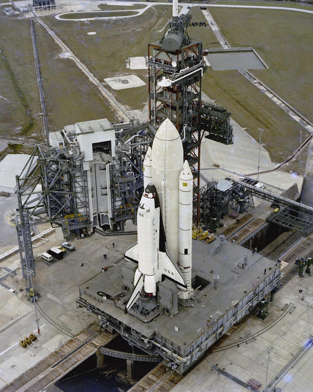 KENNEDY SPACE CENTER, FLA. - STS-1 arrived at Launch Complex 39A this afternoon at the end of a three-and-a-half mile journey from the Vehicle Assembly Building. The first Space Shuttle assembly will undergo an extensive series of pad validation tests and a dress rehearsal for launch - including a 20-second test firing of the orbiter’s three main engines - before being cleared for flight. The STS-1 mission, known as a shuttle systems test flight, will seek to demonstrate safe launch into orbit and safe return of the orbiter and crew and verify the combined performance of the entire shuttle vehicle -- orbiter, solid rocket boosters and external tank. STS-1 will be launched from Pad A at the Kennedy Space Center's Launch Complex 39 no earlier than March 1981.