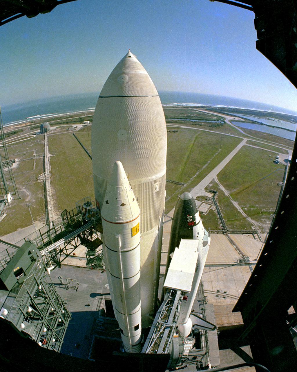 KENNEDY SPACE CENTER, FLA. -  The first Space Shuttle vehicle destined to fly in space arrives at its launch site, Pad A at Complex 39, following a 3.5-mile move from the Vehicle Assembly Building where the vehicle was assembled.  The rollout of the STS-1 vehicle - consisting of America's first reusable spaceship, Columbia, the external propellant tank and twin solid rocket boosters - from the VAB to the launch pad is a major milestone in the series of events that will lead to its scheduled liftoff in March 1981.