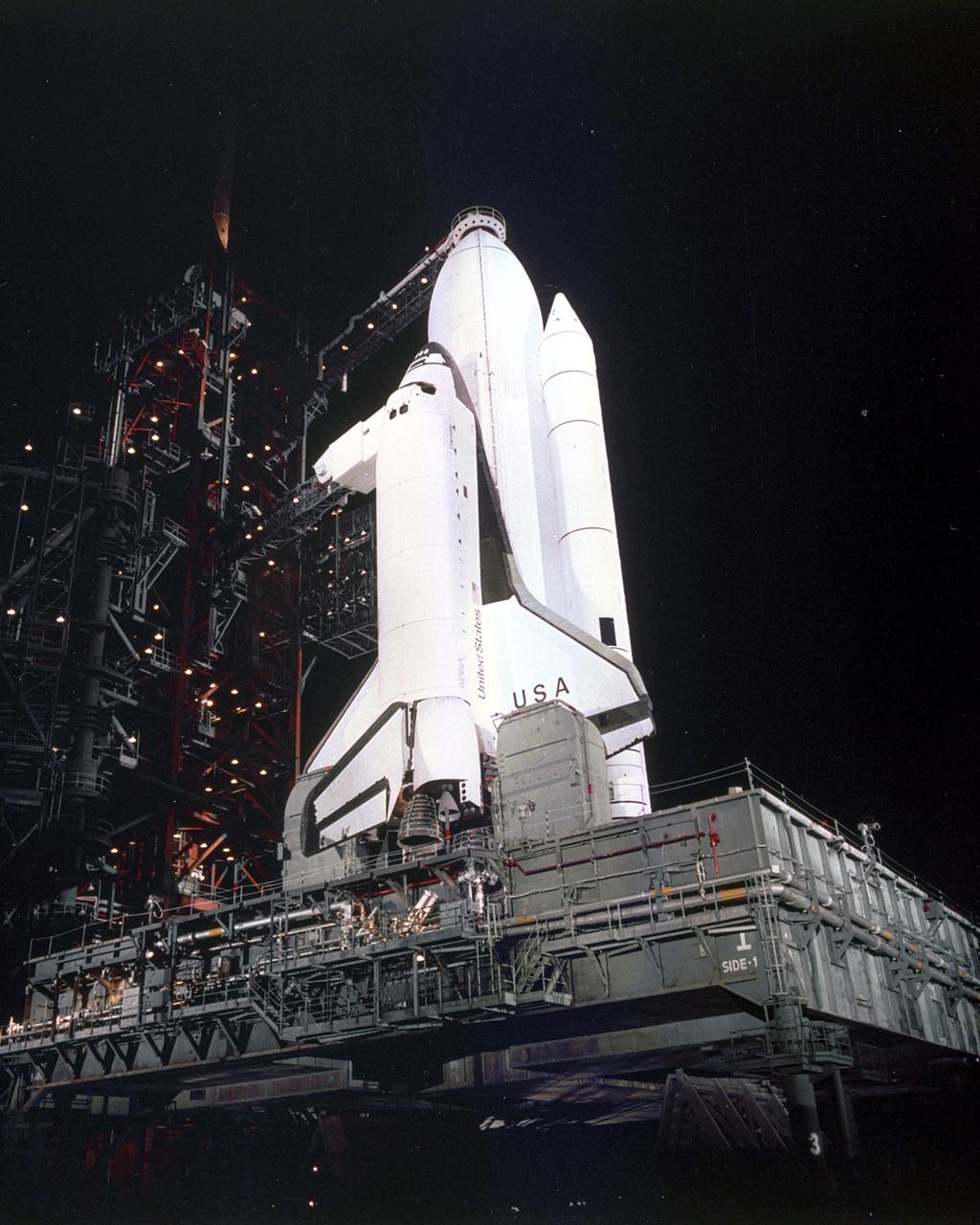 KENNEDY SPACE CENTER, FLA. -  The Space Shuttle Columbia,  (STS-1) stands poised for its maiden flight into space from Launch Pad A, Complex 39, following retraction of the Rotating Service Structure (RSS).