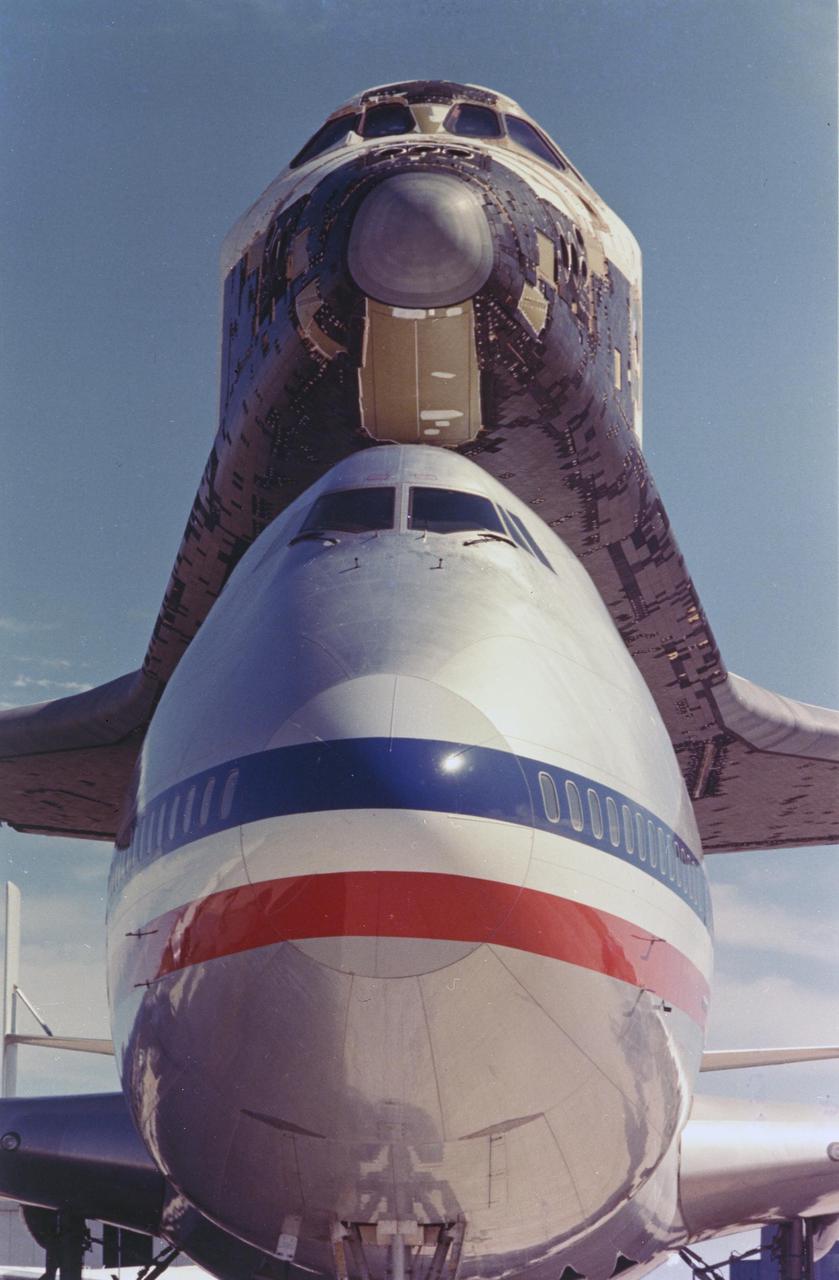 KENNEDY SPACE CENTER, FLA.  -   With the desert sky behind it, the Space Shuttle Columbia and 747_Shuttle Carrier Aircraft are poised for the return flight to the Kennedy Space Center in Florida.  After the successful first mission of the Space Shuttle, the orbiter was returned from the desert by a piggyback flight where it landed at KSC. Preparations now begin for the second launch.