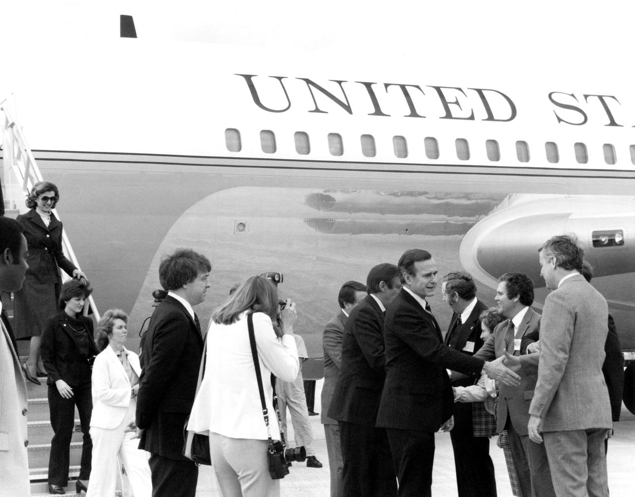 KENNEDY SPACE CENTER, FLA. -- Vice President George H.W. Bush, center left, is welcomed to KSC's Shuttle Landing facility.  At the Center for the Spacelab Arrival Ceremony, the vice president is greeted by, from left, Center Director Richard G. Smith; Mrs. Smith; U.S.  Rep. Ronnie Flippo, D-Ala.; an Robert Allnut, director of external affairs for NASA Headquarters.  In the welcoming party but not pictured was U.S. Rep. Bill Nelson, D-Fla.