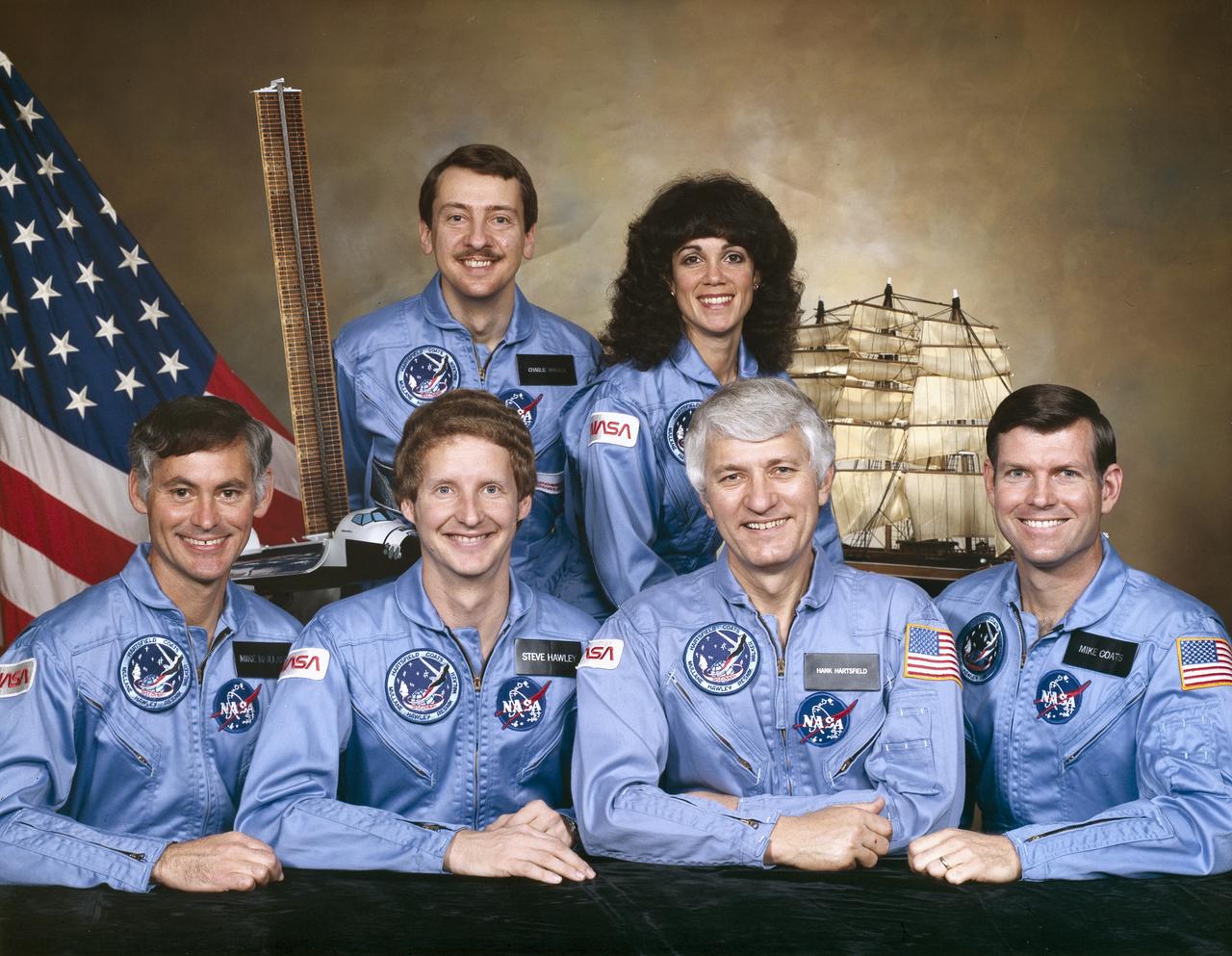 The crew assigned to the STS-41D mission included (seated left to right) Richard M. (Mike) Mullane, mission specialist; Steven A. Hawley, mission specialist; Henry W. Hartsfield, commander; and Michael L. (Mike) Coats, pilot.  Standing in the rear are Charles D. Walker, payload specialist; and Judith A. (Judy) Resnik, mission specialist. Launched aboard the Space Shuttle Discovery August 30, 1984 at 8:41:50 am (EDT), the STS-41D mission deployed three satellites: the Satellite Business System SBS-D; the SYCOM IV-2 (also known as LEASAT-2); and the TELSTAR.