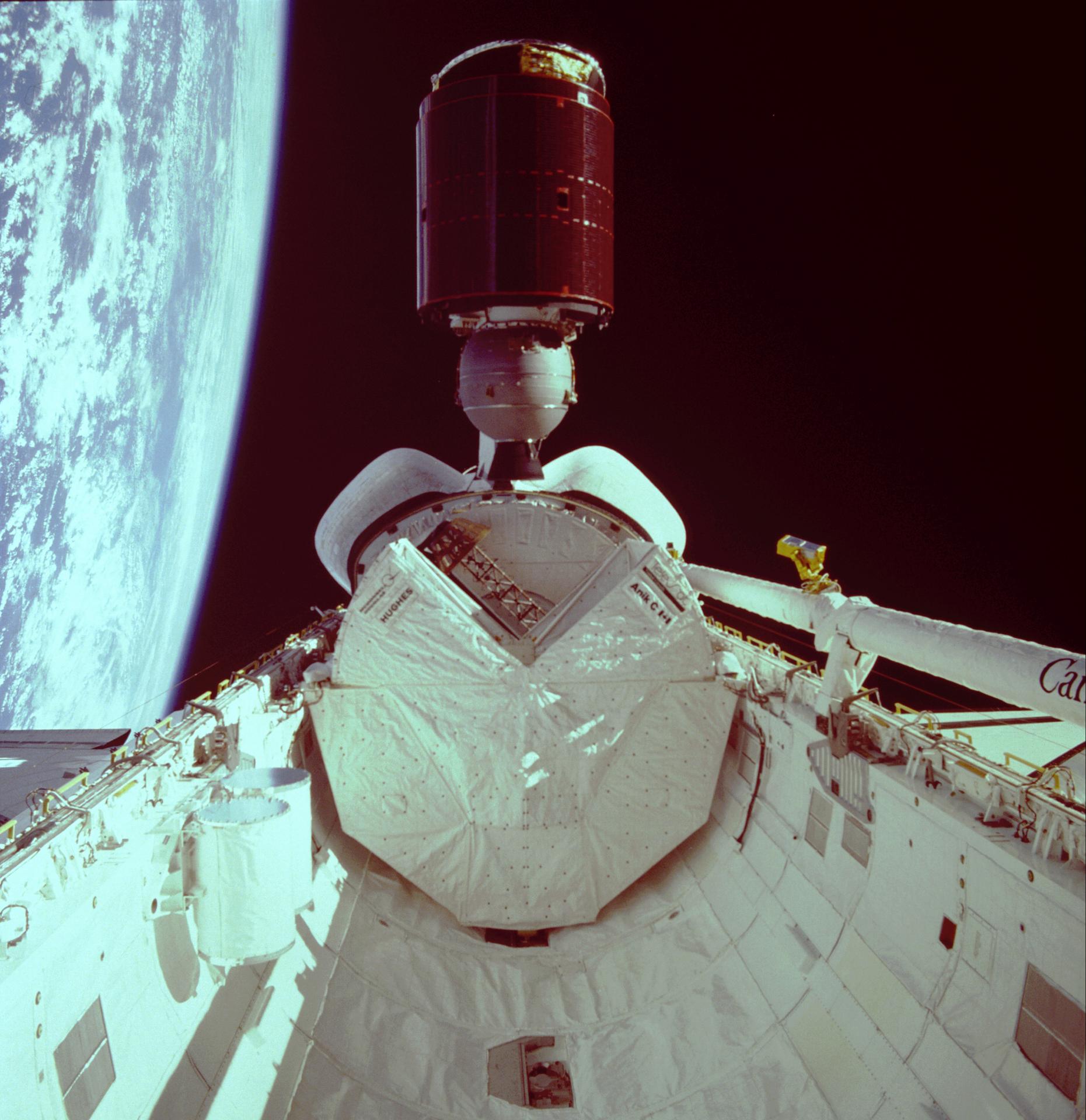 The TELESAT-1 satellite is released from the cargo bay of Discovery during STS-51D