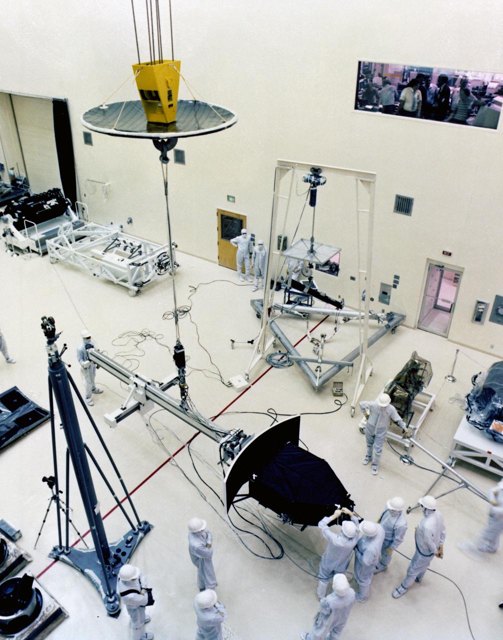 In this photograph, engineers and technicians prepare the Hubble Space Telescope's (HST's) Wide Field and Planetary Camera (WF/PC) for installation at the Lockheed Missile and Space Company. The WF/PC is designed to investigate the age of the universe and to search for new planetary systems around young stars. It takes pictures of large numbers of galaxies and close-ups of planets in our solar system. The HST is the first of NASA's great observatories and the most complex and sensitive optical telescope ever made. The purpose of the HST is to study the cosmos from a low-Earth orbit by placing the telescope in space, enabling astronomers to collect data that is free of the Earth's atmosphere. The HST was deployed from the Space Shuttle Discovery (STS-31 mission) into Earth orbit in April 1990. The Marshall Space Flight Center had overall responsibility for design, development, and construction of the HST. The Perkin-Elmer Corporation, in Danbury, Cornecticut, developed the optical system and guidance sensors. The Lockheed Missile and Space Company, Sunnyvale, California, produced the protective outer shroud and spacecraft systems, and assembled and tested the finished telescope.