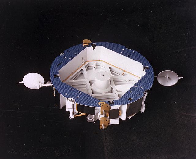 In this 1986 artist's concept, the Orbital Maneuvering Vehicle (OMV), is shown without its main propulsion module. Essentially two propulsion vehicles in one, the OMV could be powered by a main propulsion module , or, in its short range vehicle configuration shown here, use its own hydrazine and cold gas thrusters. As envisioned by Marshall Space Flight Center plarners, the OMV would be a remotely-controlled free-flying space tug which would place, rendezvous, dock, and retrieve orbital payloads.