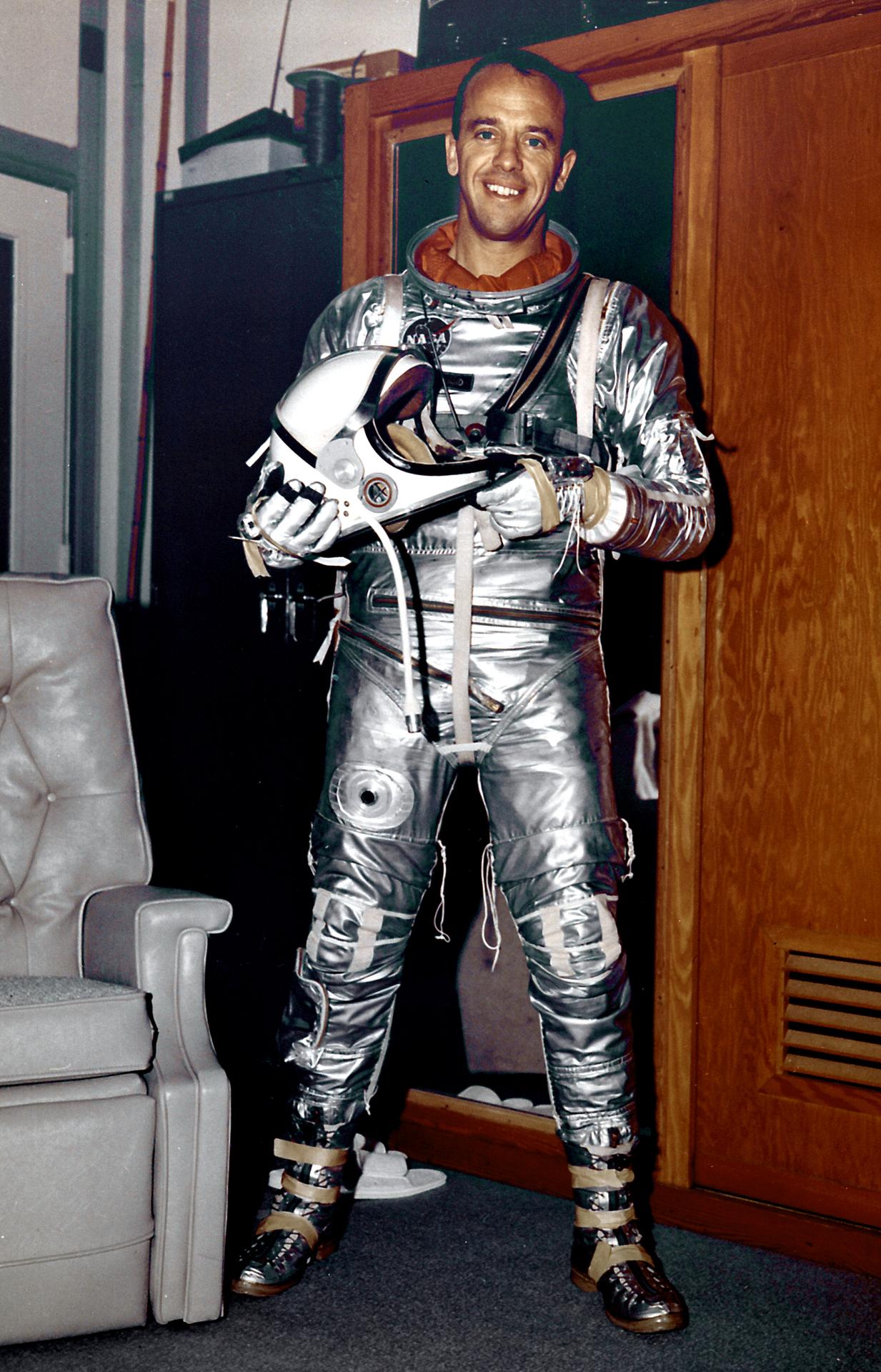 Alan B Shepard wears his silver space suit