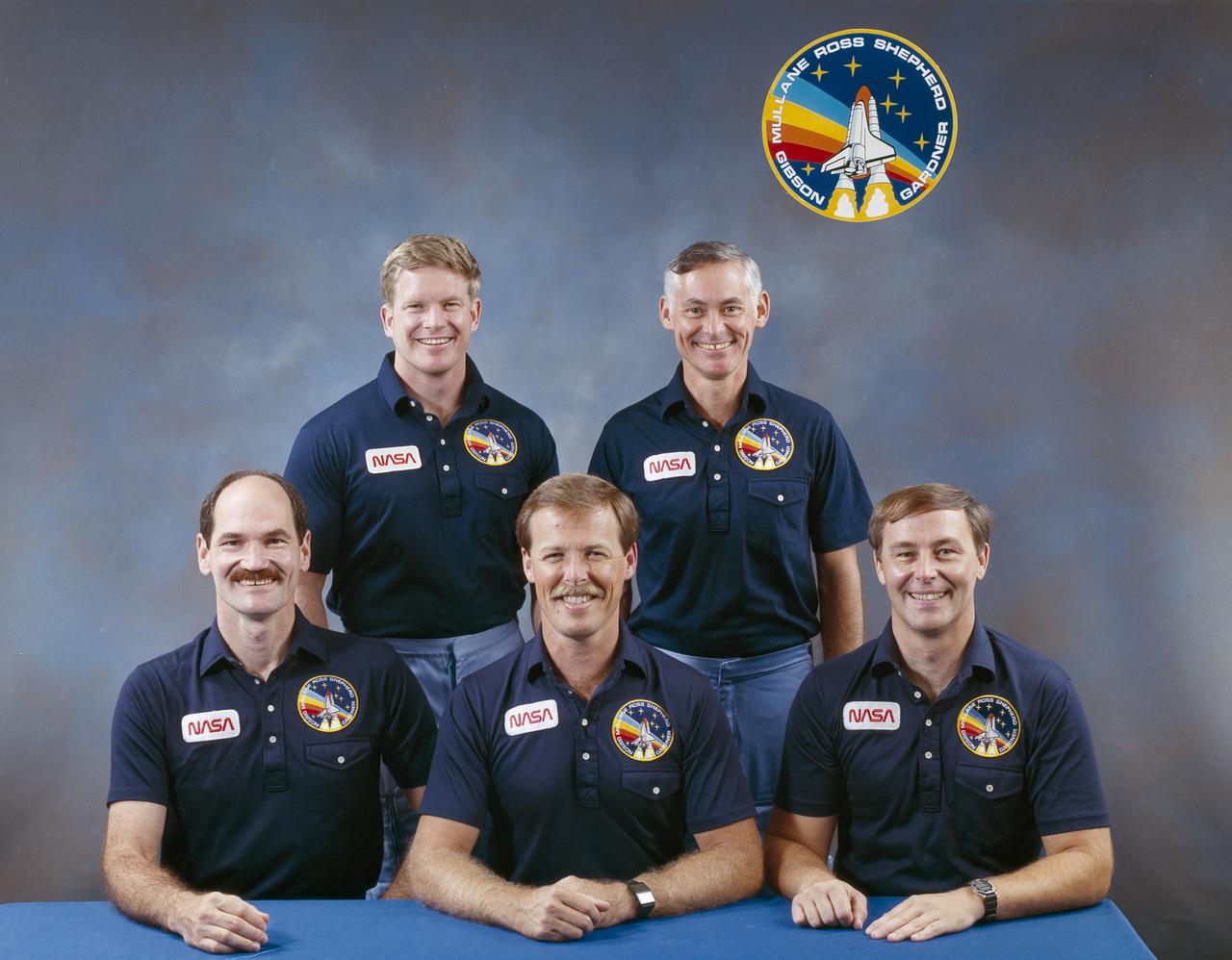 The STS-27 crew portrait features 5 astronauts.  Seated, left to right, are Jerry L. Ross, mission specialist; Guy S. Gardner, pilot; and Robert L. Gibson, commander. On the back row, left to right, are mission specialists Richard M. Mullane, and William M. Shepherd. Launched aboard the Space Shuttle Atlantis on December 2, 1988 at 9:30:34 am (EST), the STS-27 mission was the third mission dedicated to the Department of Defense (DOD).