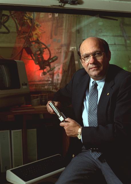 Marshall's fifth Center Director, James R. Thompson (1986-1989), in the control room of the Solid Rocket Booster (SRB)automated thermal protection system (TPS) removal facility. Under Dr. Thompson's leadership, the shuttle program was rekindled after the Challenger explosion. Return to Flight kept NASA 's future programs alive.