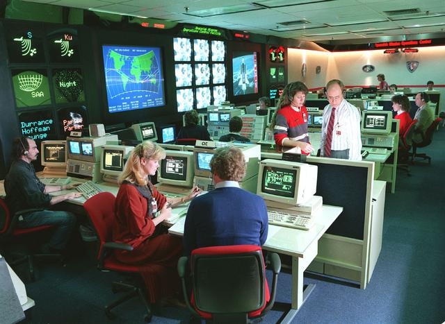 Activities in the Spacelab Mission Operations Control facility at the Marshall Space Flight Center (MSFC) are shown in this photograph. All NASA Spacelab science missions were controlled from and the science astronauts were supported by this facility during the missions. Teams of flight controllers and researchers at the MSFC Space Mission Operations Control Center directed all NASA science operations, sent commands directly to the crew of Spacelab, and received and analyzed data from experiments on board the Spacelab. The facility used the air/ground communications charnels between the astronauts and ground control teams during the Spacelab missions. Spacelab science operations were a cooperative effort between the science astronaut crew in orbit and their colleagues in the Space Mission Operations Control Center. Though the crew and the instrument science teams were separated by many miles, they interacted with one another to evaluate observations and solve problems in much the same way as they would when working side by side in a ground-based laboratory. Most of the action was centered in two work areas: The payload control area from which the overall payload was monitored and controlled and the science operations area where teams of scientists monitored their instruments and direct experiment activities. This facility is no longer operational since the last Spacelab mission, U.S. Microgravity Payload-4 in December 1997, and has become one of the historical sites at MSFC. The facility was reopened as the International Space Station Payload Operations Center in March 2001.