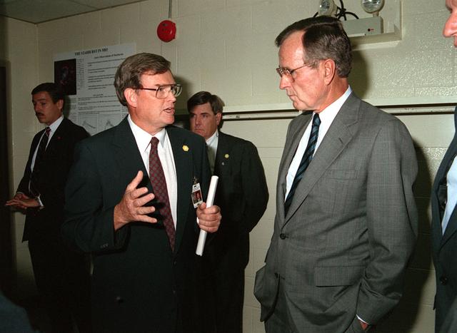 President George Bush is taken for a tour of Huntsville Operations Support Center (HOSC) by Marshall's sixth Center Director Thomas J. Lee (1989-1994).