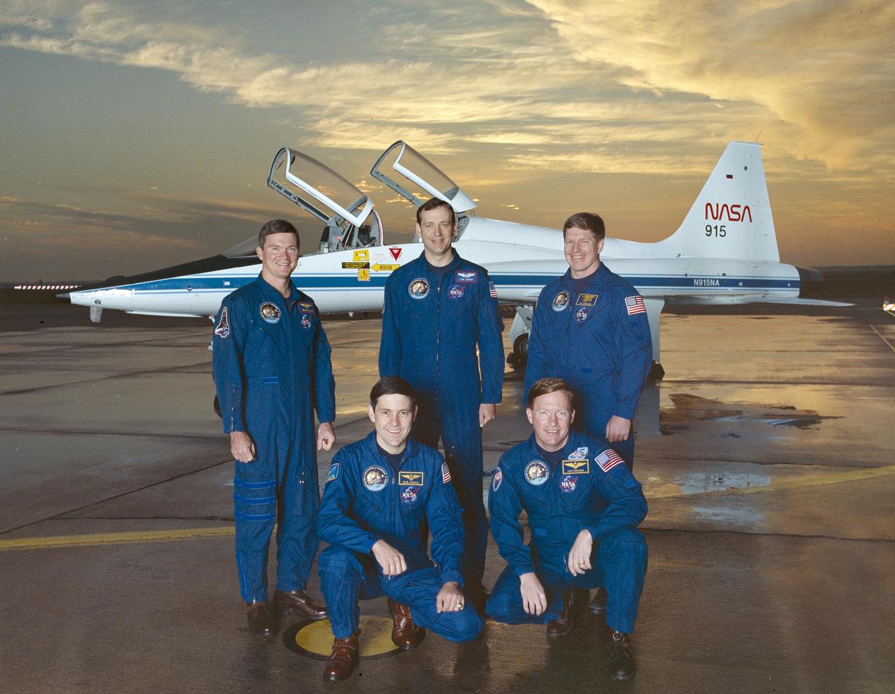 The 5 member crew of the STS-41 mission included (left to right): Bruce E. Melnick, mission specialist 2; Robert D. Cabana, pilot; Thomas D. Akers, mission specialist 3; Richard N. Richards, commander; and William M. Shepherd, mission specialist 1. Launched aboard the Space Shuttle Discovery on October 6, 1990 at 7:47:15 am (EDT), the primary payload for the mission was the ESA built Ulysses Space Craft made to explore the polar regions of the Sun. Other main payloads and experiments included the Shuttle Solar Backscatter Ultraviolet (SSBUV) experiment and the INTELSAT Solar Array Coupon (ISAC).