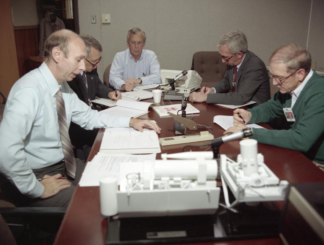 The primary objective of the STS-35 mission was round the clock observation of the celestial sphere in ultraviolet and X-Ray astronomy with the Astro-1 observatory which consisted of four telescopes: the Hopkins Ultraviolet Telescope (HUT); the Wisconsin Ultraviolet Photo-Polarimeter Experiment (WUPPE); the Ultraviolet Imaging Telescope (UIT); and the Broad Band X-Ray Telescope (BBXRT). The Huntsville Operations Support Center (HOSC) Spacelab Payload Operations Control Center (SL POCC) at the Marshall Space Flight Center (MSFC) was the air/ground communication channel used between the astronauts and ground control teams during the Spacelab missions. Teams of controllers and researchers directed on-orbit science operations, sent commands to the spacecraft, received data from experiments aboard the Space Shuttle, adjusted mission schedules to take advantage of unexpected science opportunities or unexpected results, and worked with crew members to resolve problems with their experiments. Due to loss of data used for pointing and operating the ultraviolet telescopes, MSFC ground teams were forced to aim the telescopes with fine tuning by the flight crew. This photo captures the activities at the Mission Manager Actions Room during the mission.