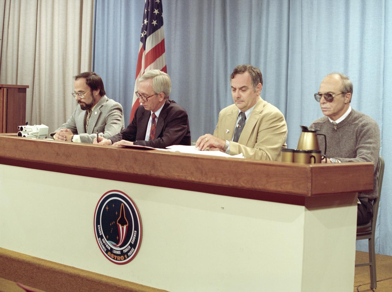 The primary objective of the STS-35 mission was round the clock observation of the celestial sphere in ultraviolet and X-Ray astronomy with the Astro-1 observatory which consisted of four telescopes: the Hopkins Ultraviolet Telescope (HUT); the Wisconsin Ultraviolet Photo-Polarimeter Experiment (WUPPE); the Ultraviolet Imaging Telescope (UIT); and the Broad Band X-Ray Telescope (BBXRT). The Huntsville Operations Support Center (HOSC) Spacelab Payload Operations Control Center (SL POCC) at the Marshall Space Flight Center (MSFC) was the air/ground communication channel used between the astronauts and ground control teams during the Spacelab missions. Teams of controllers and researchers directed on-orbit science operations, sent commands to the spacecraft, received data from experiments aboard the Space Shuttle, adjusted mission schedules to take advantage of unexpected science opportunities or unexpected results, and worked with crew members to resolve problems with their experiments. Due to loss of data used for pointing and operating the ultraviolet telescopes, MSFC ground teams were forced to aim the telescopes with fine tuning by the flight crew. This photo captures a press briefing at MSFC during STS-35, ASTRO-1 Mission.